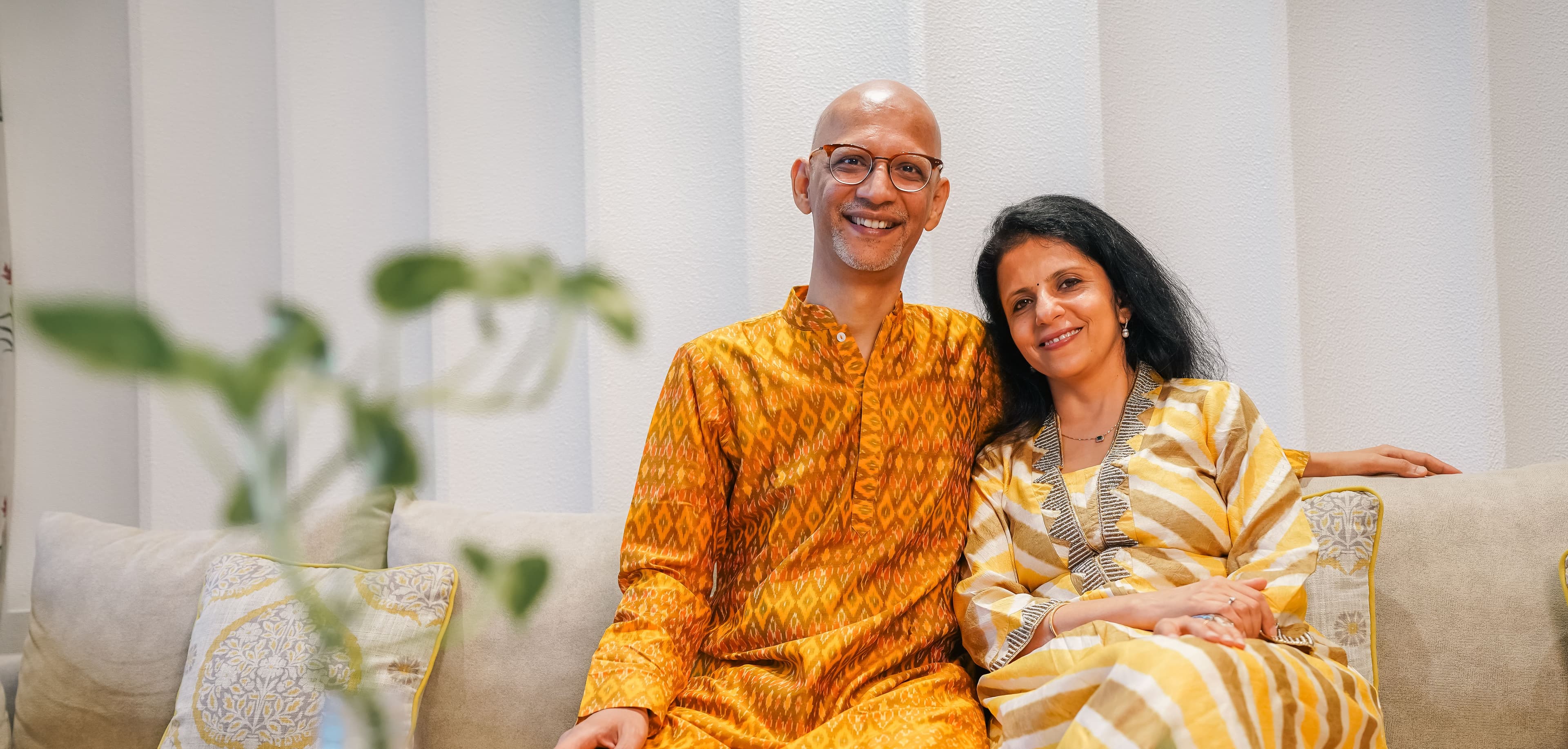 Ganesh and Dr. Preeti on the sofa